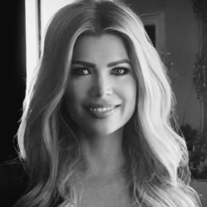 Portrait of Erin Graham, a professional stylist at Theaology Salon & Day Spa, showcasing their expertise and style.